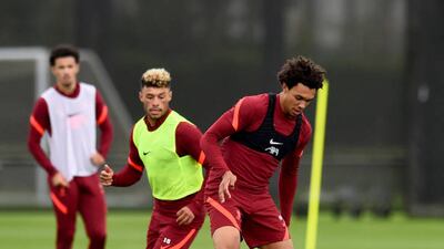 Trent Alexander-Arnold and Alex Oxlade-Chamberlain during Liverpool's training session.