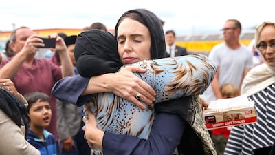 New Zealand Prime Minister Jacinda Ardern embraces a woman outside the Kilbirnie Mosque in Wellington on Sunday, after the attacks on two mosques in Christchurch last Friday. Getty
