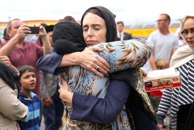 New Zealand Prime Minister Jacinda Ardern embraces a woman outside the Kilbirnie Mosque in Wellington on Sunday, March 18, after the attacks on two mosques in Christchurch on March 15. Getty Images