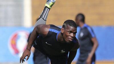 France’s Paul Pogba stretches during a training session at the Centre Robert Louis Dreyfus, in Marseille, southern France, Wednesday, July 6, 2016. France will face Germany in a Euro 2016 semi-final match in Marseille on Thursday, July 7, 2016. Claude Paris / AP Photo
