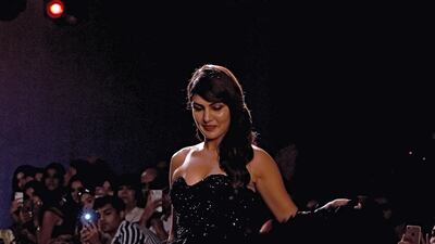 Rhea Chakraborty presents a creation by designer Ambika Lal at Lakme Fashion Week. Photo: Sujit Jaiswal / AFP