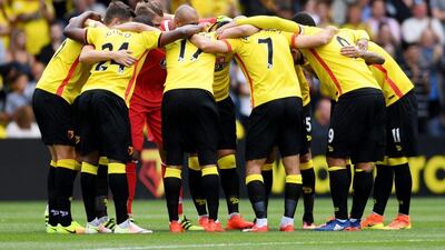 Watford team huddle before the match. Tony O’Brien / Reuters