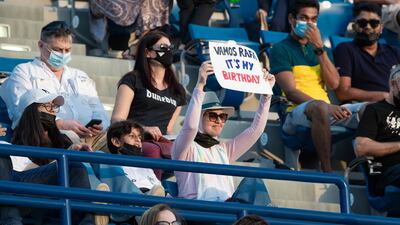 A fan displays a sign for Rafael Nadal at the Mubadala World Tennis Championship. Victor Besa / The National