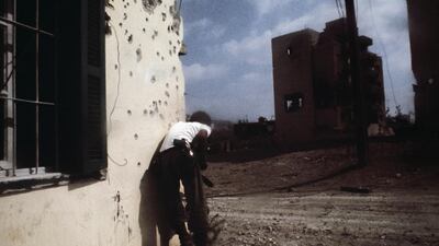 A Christian Phalangist waits in East Beirut, in August 1976. Lebanon’s lengthy civil war forms the backdrop for Rabee Jaber’s new novel, Confessions. Patrick Chauvel / Sygma / Corbis.