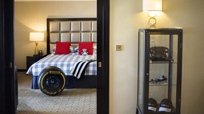 The spacious suite has a cabinet displaying Formula One memorabilia. Irene García León for The National
