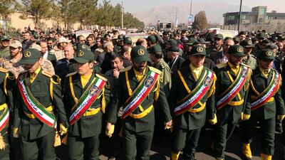 Members of the Iranian Revolutionary Guard carry the casket of Brigadier General Mohsen Ghajarian, who was killed in the Syrian city of Aleppo, during his funeral procession in Tehran on February 6, 2016. Atta Kenare / AFP