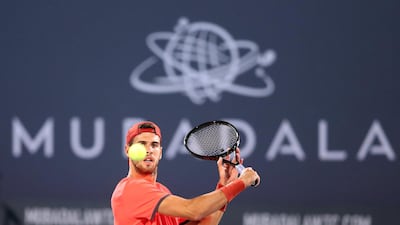 Karen Khachanov returns a shot against Novak Djokovic during their Mubadala World Tennis Championship match at Zayed Sports City. Reuters