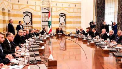 Lebanese President Michel Aoun (C) chairs the new government's first cabinet meeting, accompanied by Prime Minister Saad Hariri (C-L), at the presidential palace in Baabda, east of the capital Beirut on February 2, 2019. AFP
