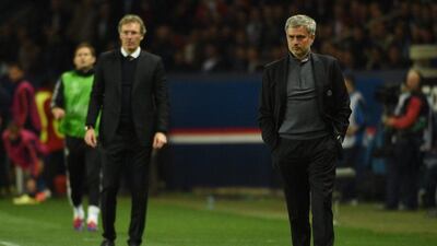 Chelsea manager Jose Mourinho, right, during Wednesday night's Champions League loss to Paris Saint-Germain. Martin Bureau / AFP / April 2, 2014