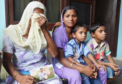 Chawinda Devi Village resident Jeeto - along with her daughter-in-law Seema - weep after news that her son Sonu was abducted in Mosul in Iraq while he was working as a construction worker there. Nothing has been heard from the men since. Sameer Sehgal/Hindustan Times via Getty Images