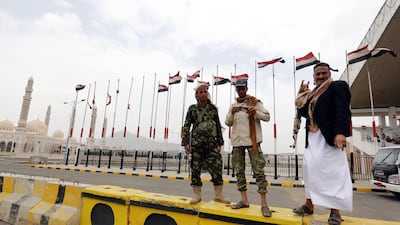 Yemeni soldiers loyal to former president Ali Abdullah Saleh stand guard at a square ahead of 35th anniversary celebrations for the formation of Mr Saleh's General People's Congress party in Sanaa on August 21, 2017. Yahya Arhab / EPA