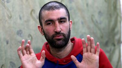 Abdul Ahad Rustam Nazarov, 28, a Tajik man who joined ISIS, says the group killed and jailed foreigners who tried to flee. Reuters