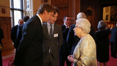 She speaks to director Tom Hooper and actor Eddie Redmayne. Getty