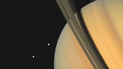 A picture of Saturn taken by the Voyager spacecraft in 1980. Taken from a distance of 13 million kilometres, it shows the planet’s moons, Tethys and Dione. Photo: Nasa