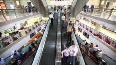 Shoppers at Al Wahda Mall in the capital. The demand for oil shows that emerging markets and the Gulf economies are recovering.