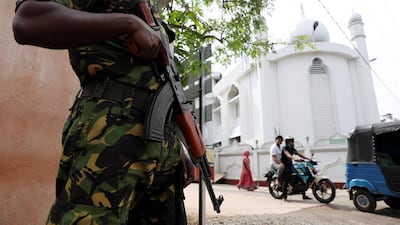 A soldier stands guard outside the Grand Mosque in Negombo. Reuters