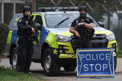 Police officers guard RAF Fairford airbase. Reuters
