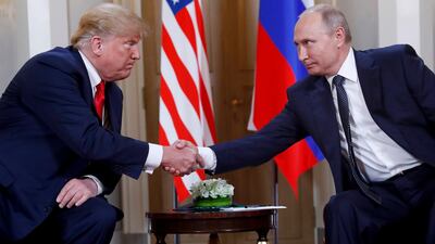 US President Donald Trump and his Russian counterpart Vladimir Putin shake hands in Helsinki. AP Photo