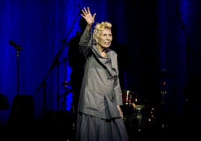 Joni Mitchell waves to the crowd during her 70th birthday tribute concert as part of the Luminato Festival at Massey Hall in Toronto in 2013. AP