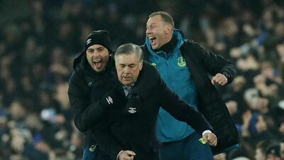 Carlo Ancelotti, centre, Duncan Ferguson, right, and Davide Ancelotti celebrate after Dominic Calvert-Lewin scores for Everton against Burnley. Reuters