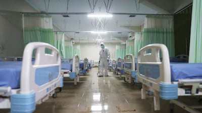 A medic inspects makeshift isolation rooms at Patriot Candrabhaga stadium for people with Covid-19 symptoms in Bekasi, on the outskirts of Jakarta, Indonesia. AP Photo