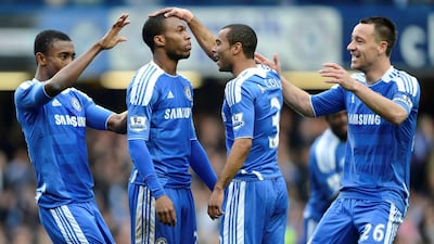 Sturridge celebrates with teammates after scoring for Chelsea against QPR in 2012. Reuters