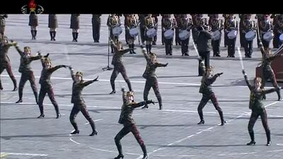 Women in uniform perform during a military parade in Pyongyang. KRT / AP