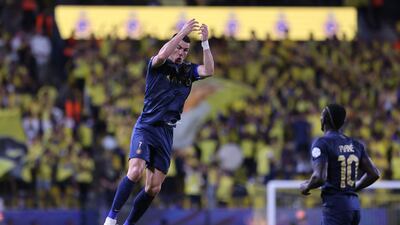 Al Nassr's Cristiano Ronaldo celebrates scoring their first goal with Sadio Mane. Reuters