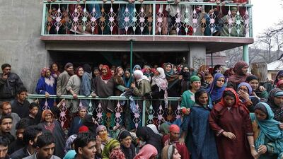 Relatives of election official Mohammad Zia-ul-Haq wail during his funeral at Herpora, south of Srinagar. In an incident on Thursday, Zia-ul-Haq was killed and five people wounded in a gun attack in Indian-ruled Kashmir, where many people stayed away from voting in a constituency that was hit by pre-poll violence. Danish Ismail / Reuters / April 25, 2014