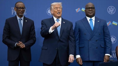 US President Donald Trump at the signing of a peace deal with Rwanda's President Paul Kagame, left, and DRC President Felix Tshisekedi in Washington on December 4. AFP