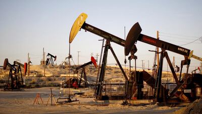 Above, pump jacks in an oil field on the Monterey Shale formation in California. US shale drillers are proving more resilient than expected to cheap crude, Opec said. David McNew / Getty Images / AFP