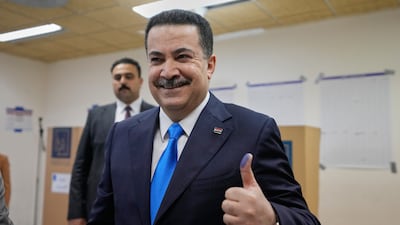 Iraqi Prime Minister Mohammed Shia Al Sudani casts his vote in the country's parliamentary election. in Baghdad. AP