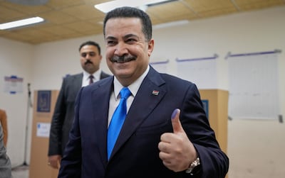 Iraqi Prime Minister Mohammed Shia Al Sudani casts his vote in the country's parliamentary election in Baghdad. AP