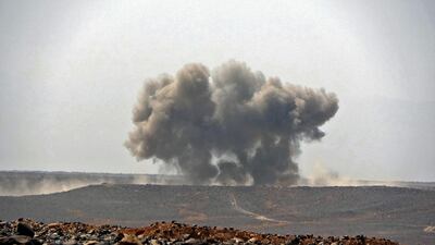 Smoke billows during clashes between forces loyal to Yemen's Saudi-backed government and Houthi rebel fighters in Yemen's northeastern province of Marib on March 5, 2021. AFP