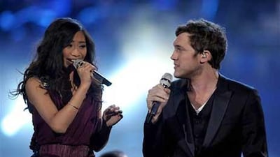 Finalists Jessica Sanchez, left, and Phillip Phillips perform onstage at the American Idol finale.