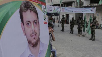 Fighters of the Ezz Al Din Al Qassam Brigades, the military wing of the Hamas movement make their condolences, to the family of engineer Fadi Al Batsh near his family house in Jabaliya, northern Gaza Strip, 21 April 2018. Mohammed Saber / EPA