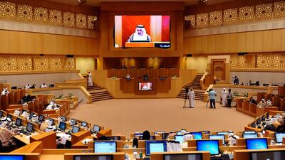 Members of the Federal National Council get down to business at a meeting in the body’s assembly hall. Wam