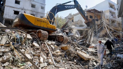 A bulldozer clears rubble after a strike near Rafic Hariri University Hospital, in Jnah, Beirut, one of several areas hit by a wave of Israeli attacks. EPA