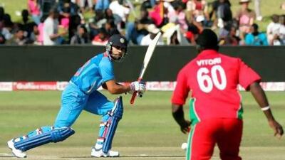 India's captain Virat Kohli, left, went for an unbeaten 68 to help lead India over Zimbabwe by seven wickets at Harare on Sunday.