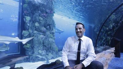 Shark expert and TV presenter Joe Romeiro at the opening of Discovery Channel Shark Week, at the Dubai Aquarium and Underwater Zoo. Jeffrey E Biteng / The National
