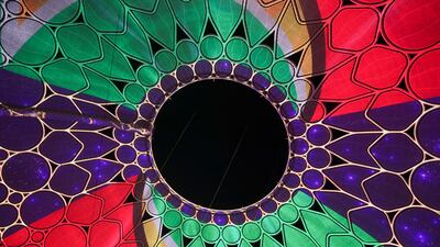 Display of a light show at the world's largest 360-degree projection dome. Khushnum Bhandari/ The National
