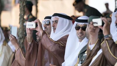 Sheikh Saif bin Zayed, centre, takes a photo. Hamad Al Kaabi / Crown Prince Court - Abu Dhabi