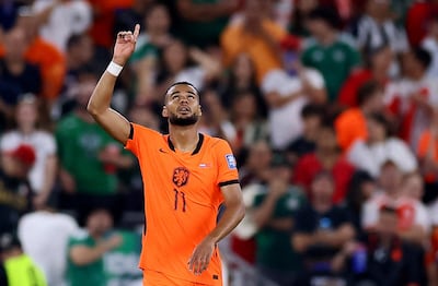Netherlands' Cody Gakpo celebrates scoring against Morocco. Reuters