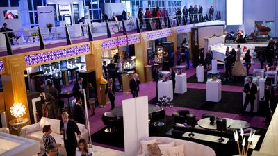 Visitors attend the World Luxury Expo in Burj Al Arab. Razan Alzayani / The National