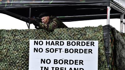 Members of the Border Communities Against Brexit take part in a mock customs border check between Ireland and the UK. Getty