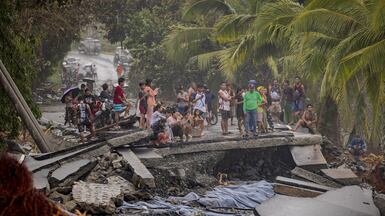 A road destroyed by storm surges brought about by Super Typhoon Fung-wong in Dipaculao, the Philippines. Getty Images