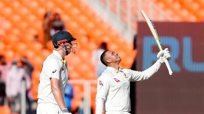 Australia's Usman Khawaja celebrates with Cameron Green after reaching his century on the opening day of the fourth Test against India at the Narendra Modi Stadium in Ahmedabad on Thursday, March 9, 2023. Reuters