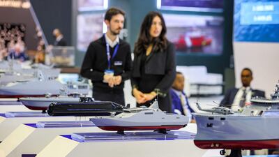 Models of surface vessels and submarines produced by Turkey's Dearsan Shipyard on display at the Doha International Maritime Defence Exhibition in the Qatari capital.