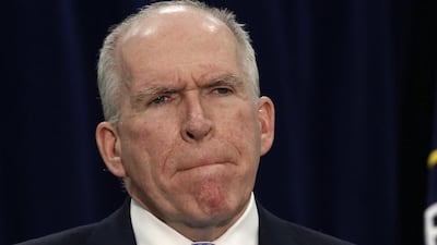 The CIA director John Brennan pauses while speaking about a senate committee report on the use of torture by his agency, at the CIA headquarters in Virginia on December 11, 2014. Larry Downing / Reuters
