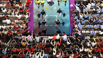 Match officials and players walk out ahead of the Fifa World Cup match between Portugal and Uruguay at Lusail Stadium in Qatar. Getty Images